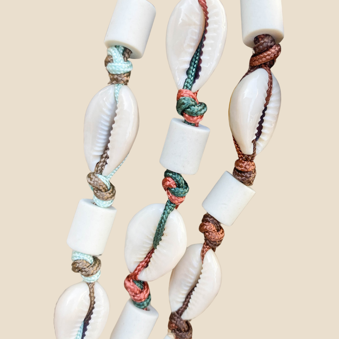 Anti-parasitaire/ Porte médaille 2 en 1