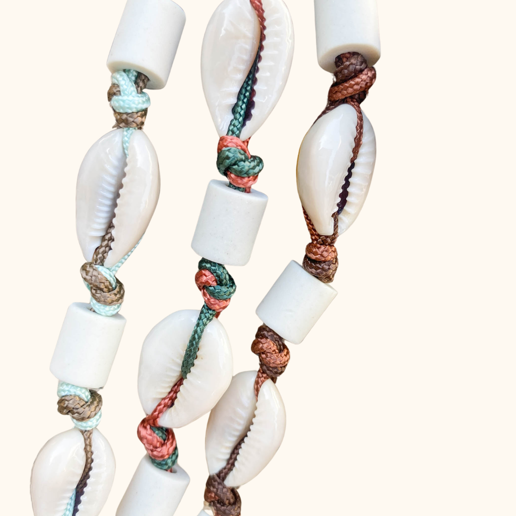 Anti-parasitaire/ Porte médaille 2 en 1